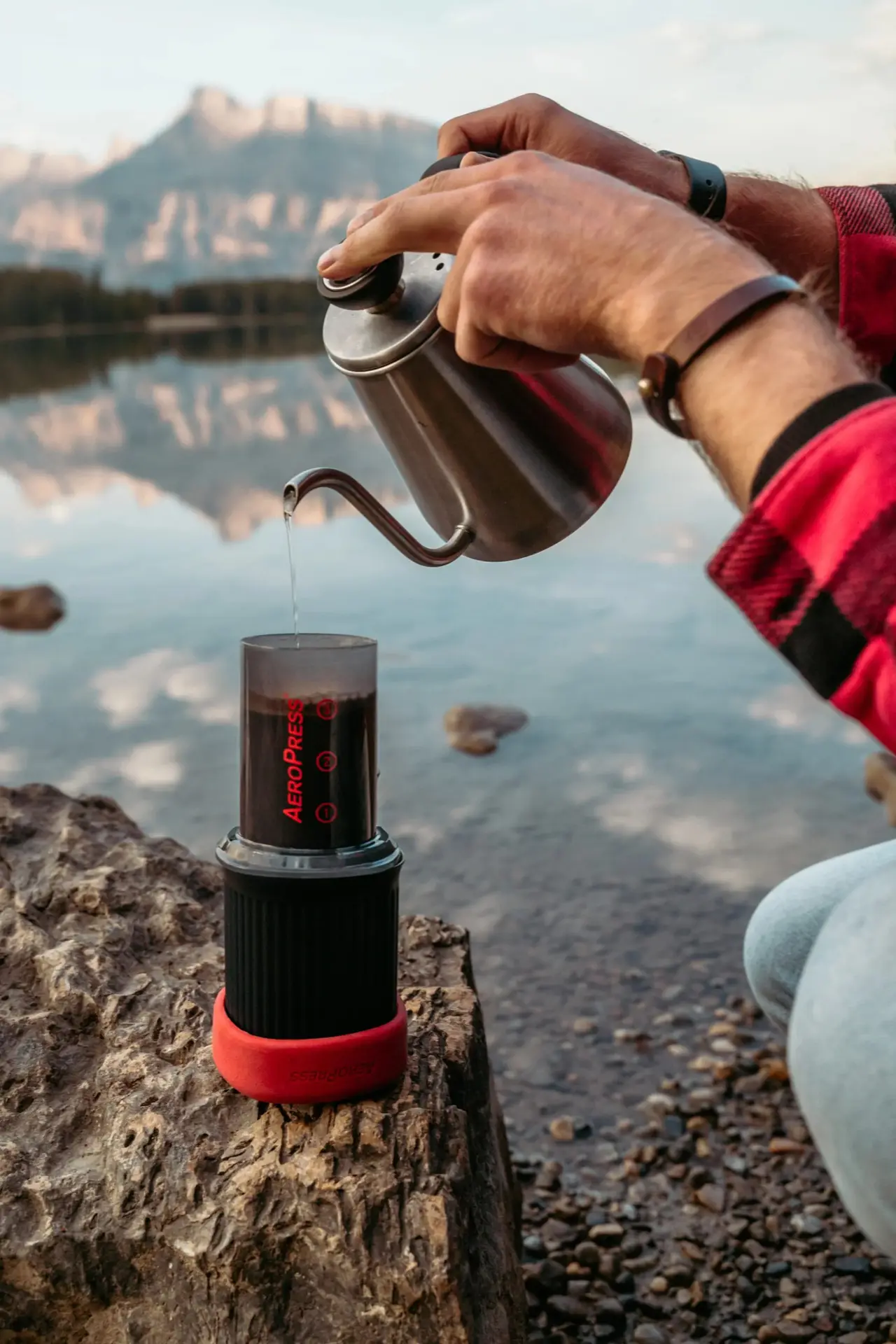 AeroPress Go portable travel coffee maker with all accessories stored inside the travel mug